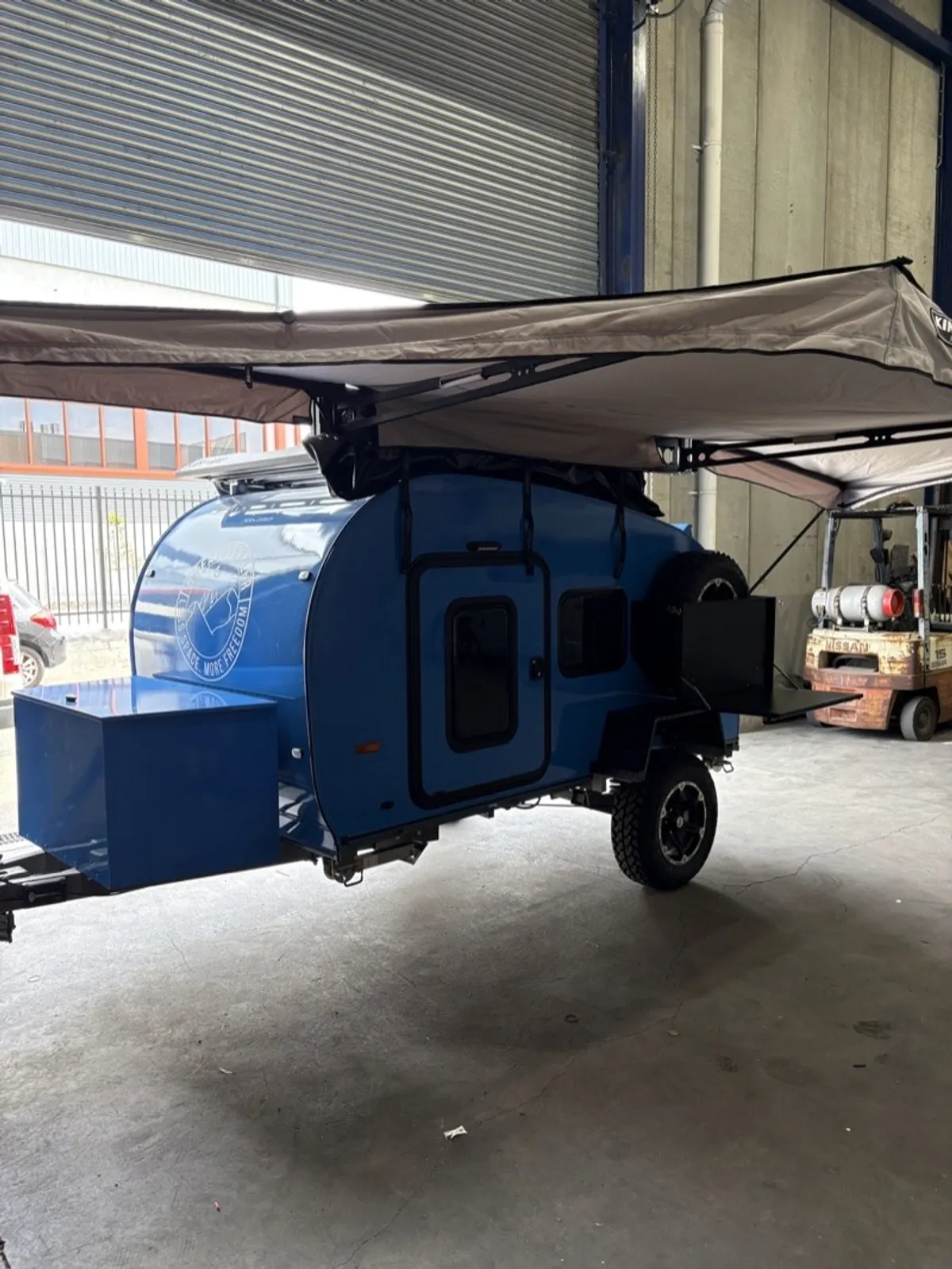 Blue Ultra front exterior at the workshop