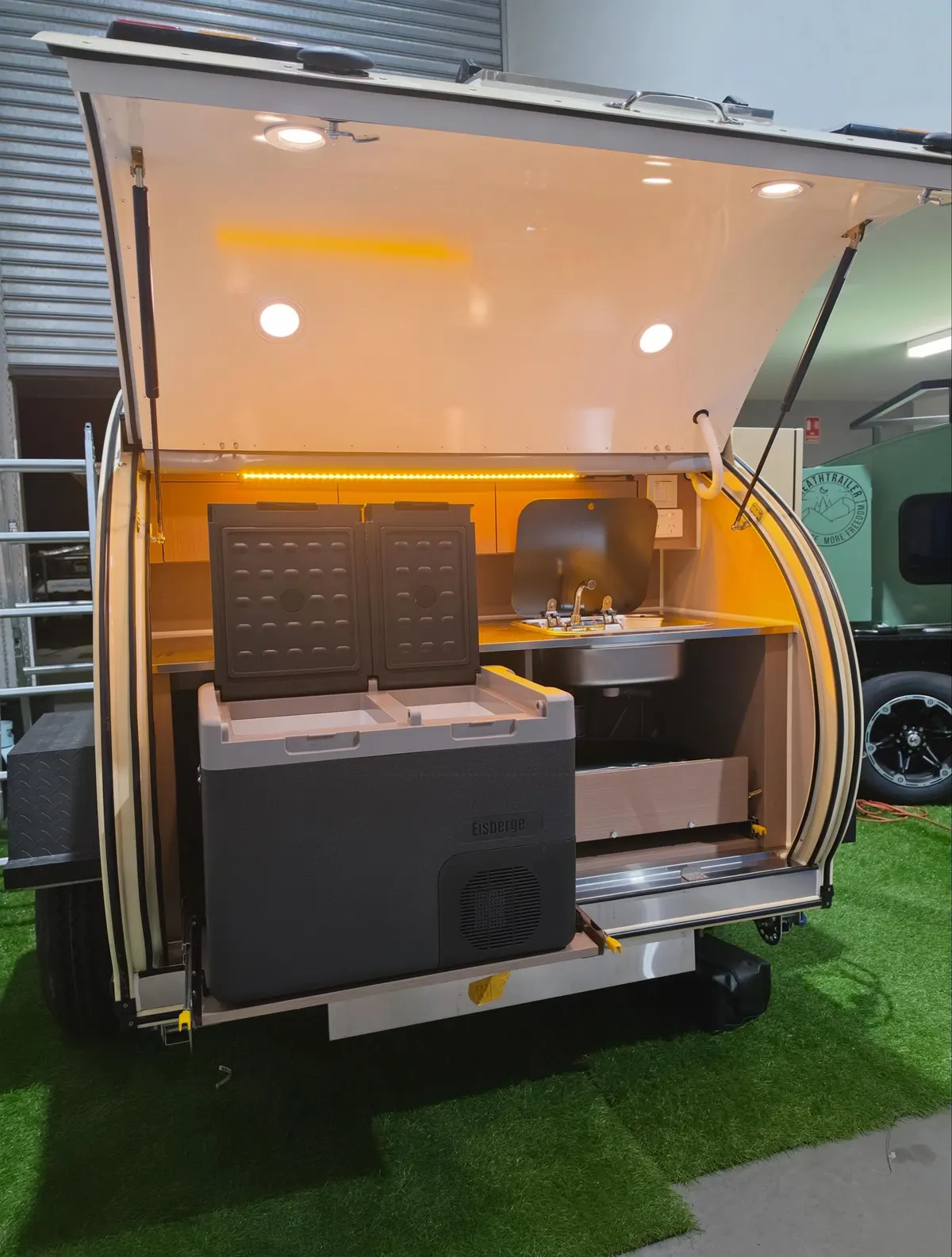 Christine’s Plus rear kitchen with raised hatch, fridge slide, sink and amber lighting
