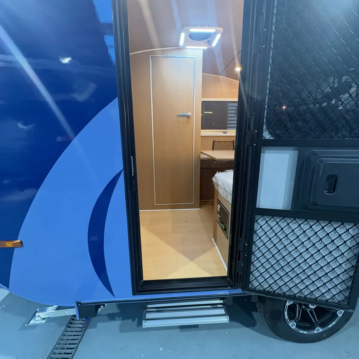 Blue Max entry step and open security mesh door