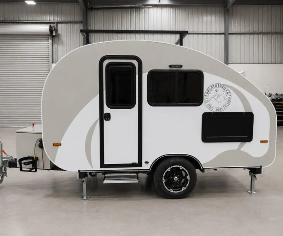 White and grey Max side profile with tall entry door