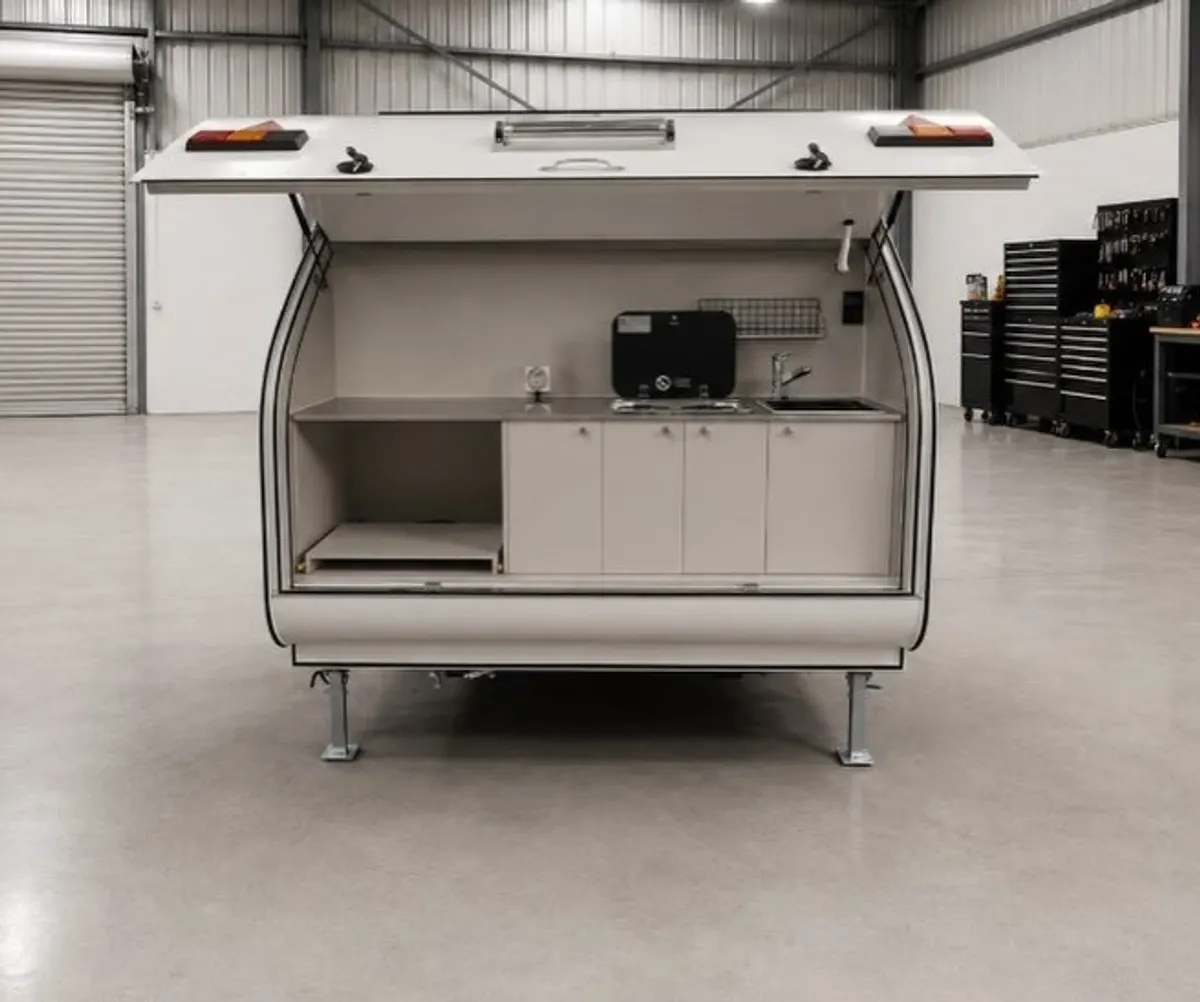 White Max rear kitchen with open hatch, bench, sink and storage