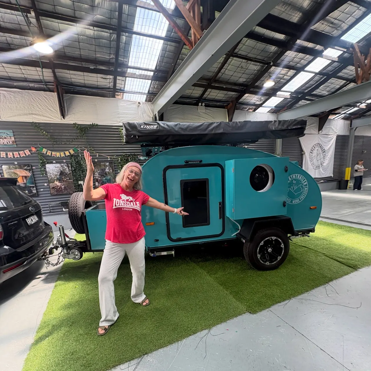 Nicole collecting her turquoise Plus at the Sydney showroom in October 2026