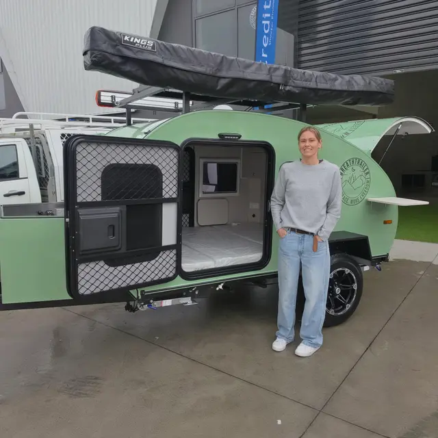 Nikki with their Breath Trailer at handover