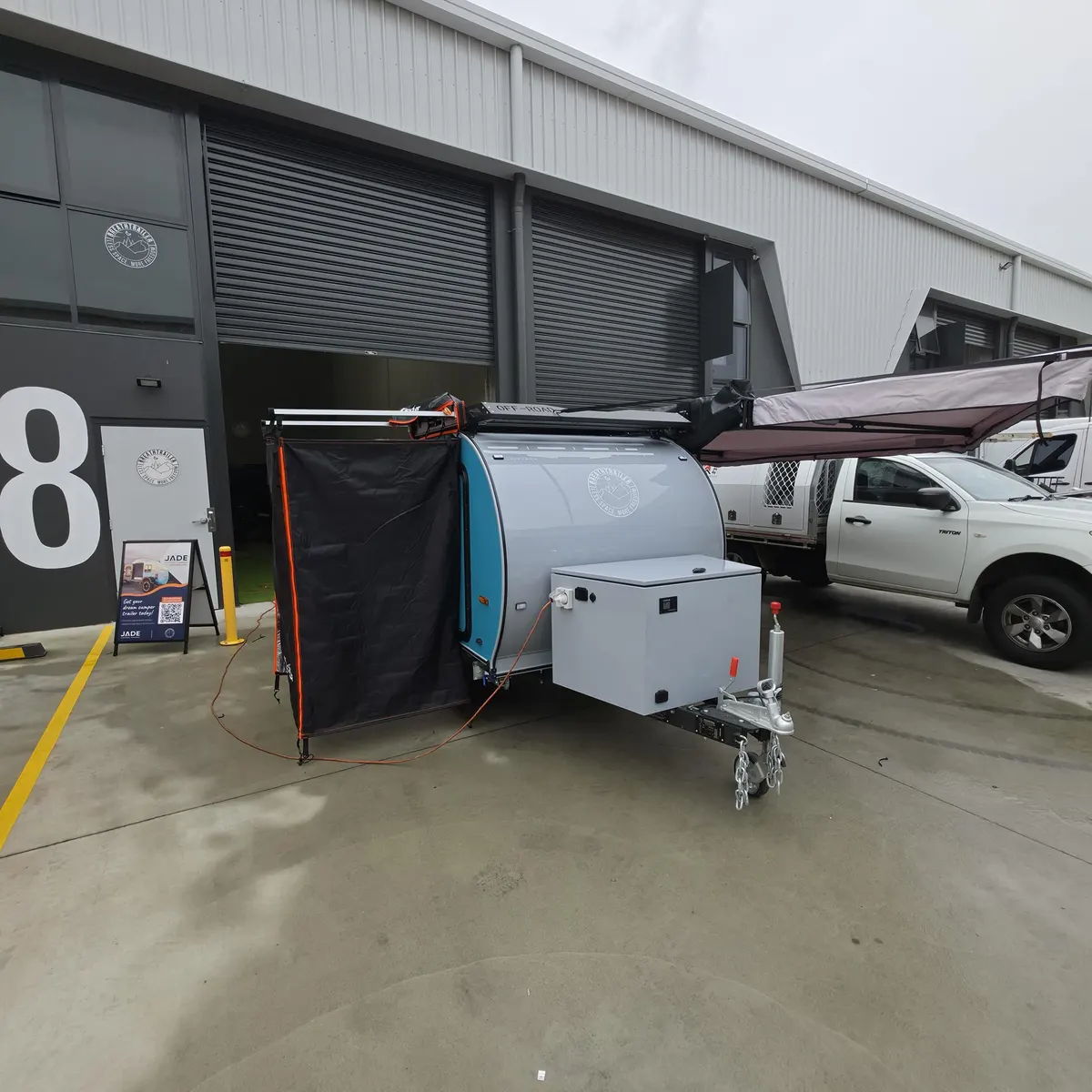 Blue Plus with optional shower enclosure beside the trailer