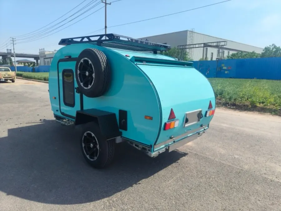 A turquoise Breath trailer with its roof rack