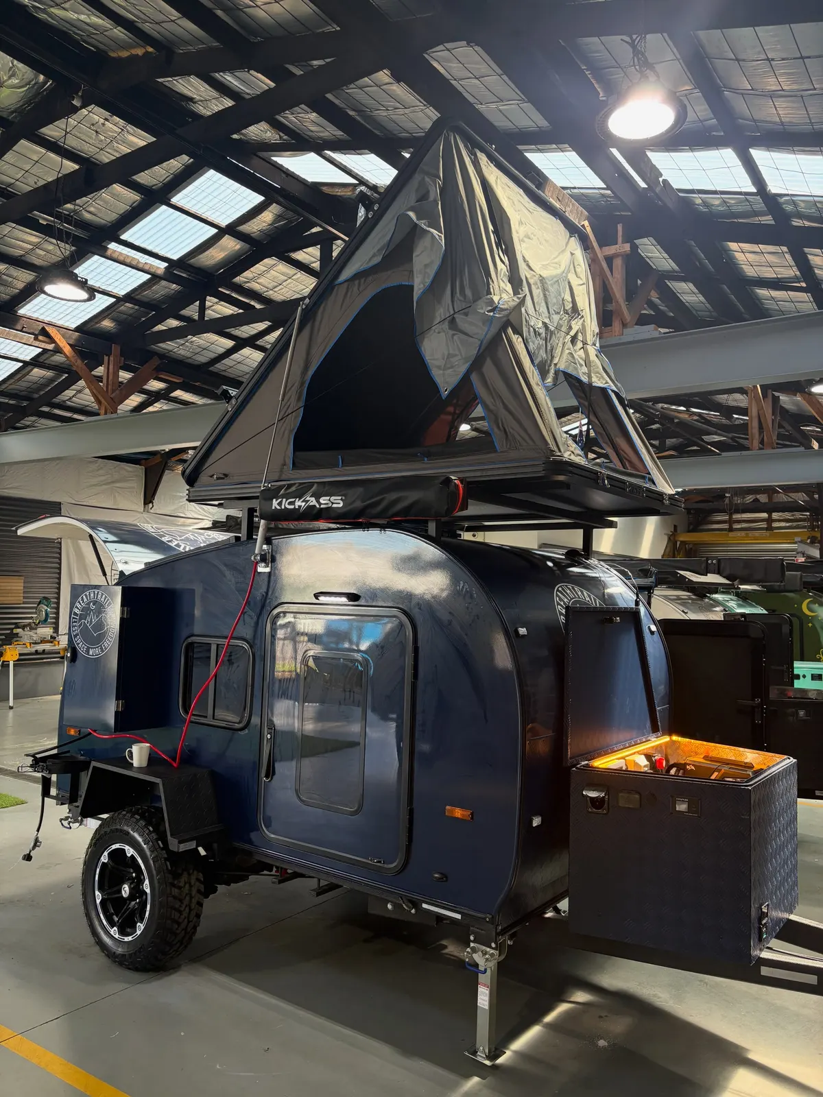 Blue Ultra front angle showing the optional rooftop tent